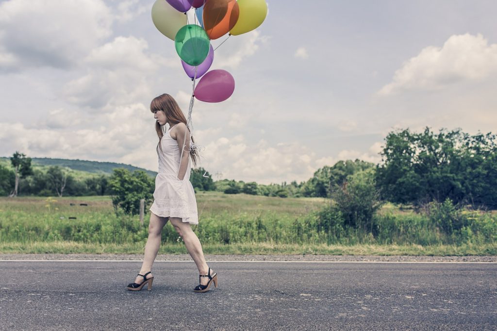 Woman with balloons