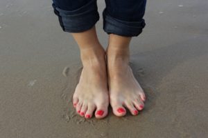 Feet on the beach standing up for self