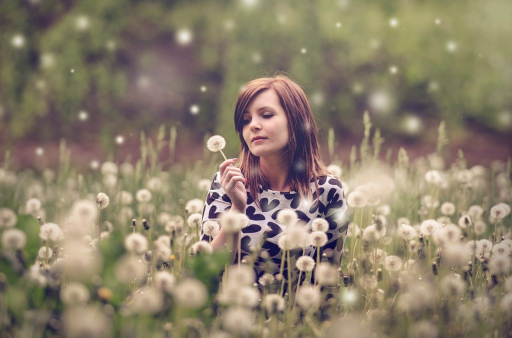Woman in Field of Dandelions