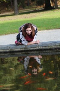 Woman reflection pond