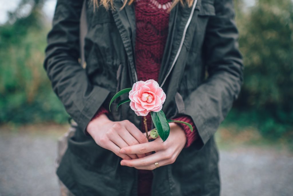 Woman holding a rose