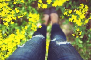 Woman in yellow flowers