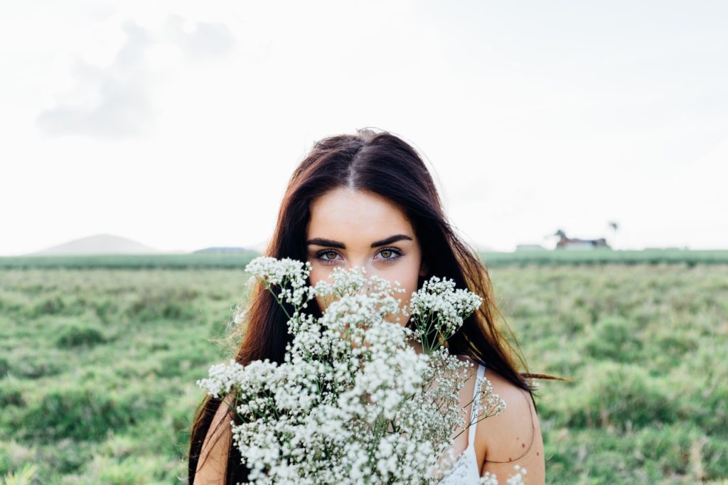 Woman with bulimia in flowers