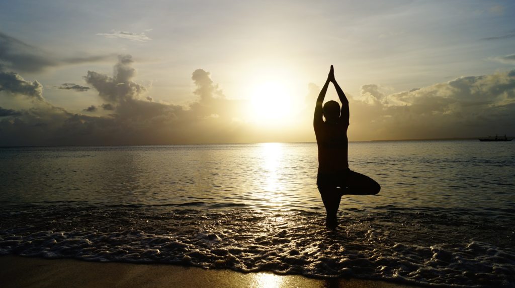 Woman doing yoga for eating disorder treatment