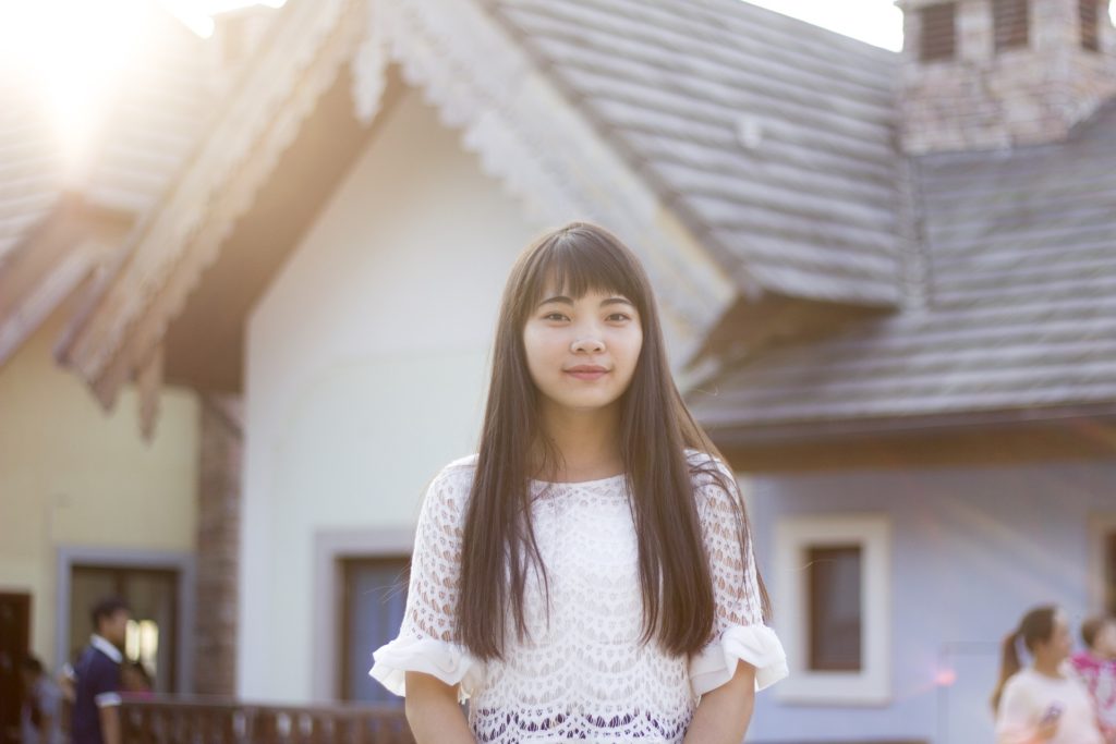 Young Woman Standing Outside Her Eating Disorder Recovery Center