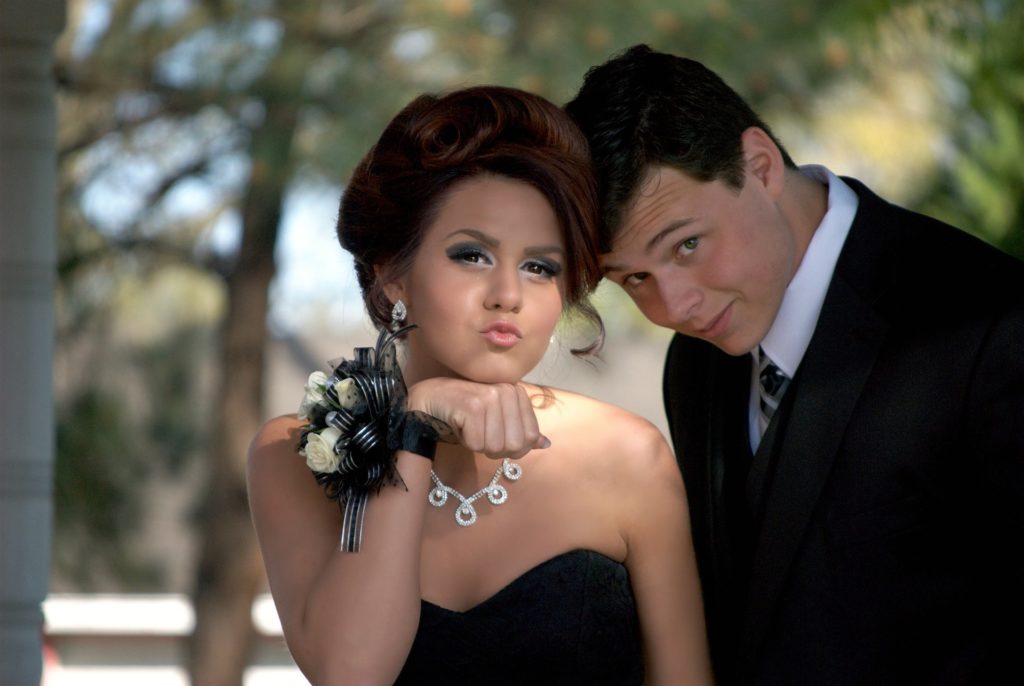 Prom couple posing