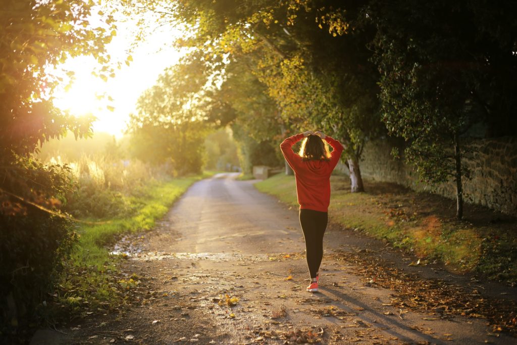 Lady waling on path in recovery