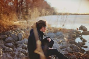 Woman with bulimia nervosa sitting by the lake