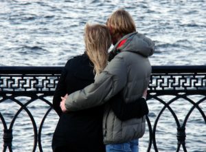 Couple on the boardwalk dealing with Anorexia and Relationship Issues