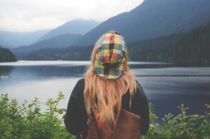 Woman looking at a lake