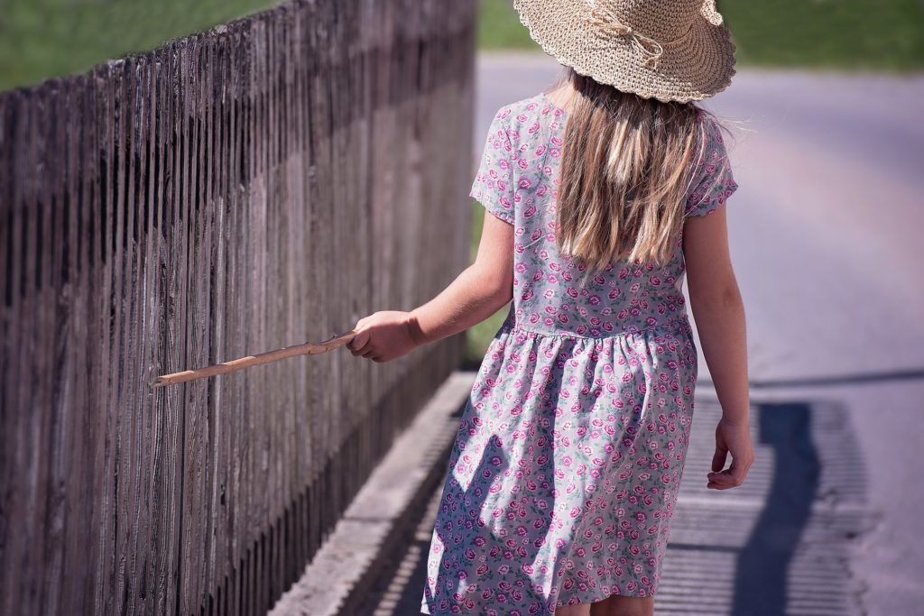 Child and fence