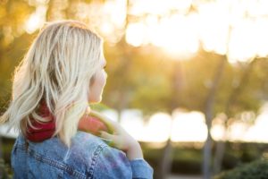 Woman outside with belief shes overweight