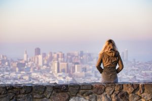 Woman looking over city