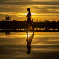 Woman on the beach struggling with co-occurring disorders