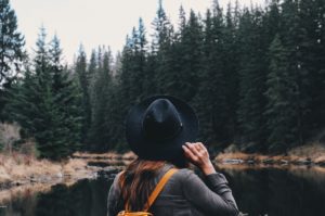 Woman standing by the river