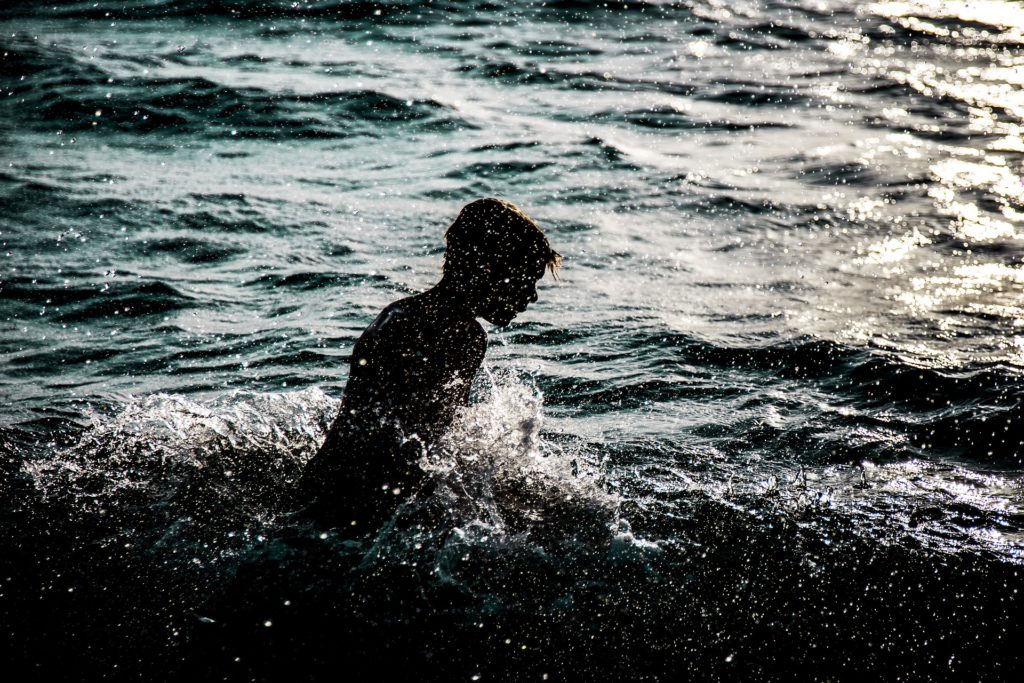 Boy playing in the water