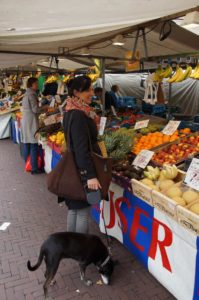 Woman buying vegetables