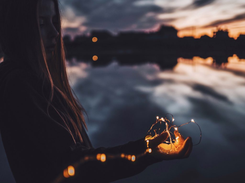 Woman holding lights