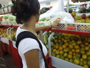 Woman shopping for fruit