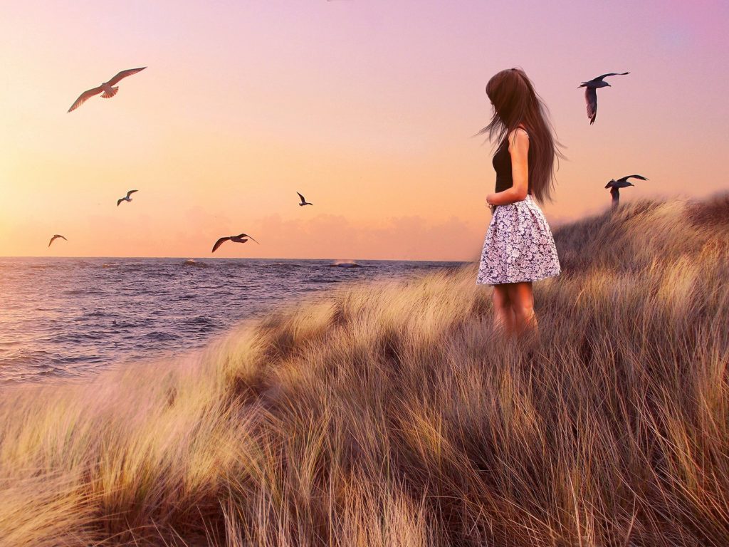 Woman standing in the grass