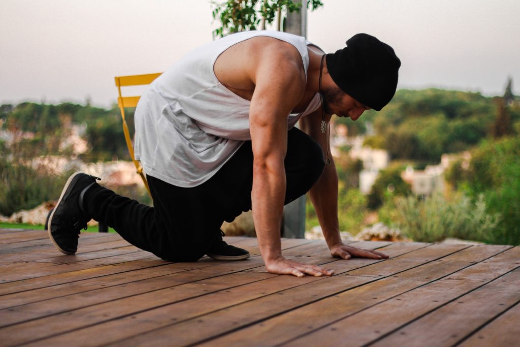Man exercising and struggling with body dysmorphia