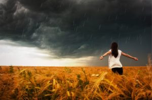 Woman dancing in the rain