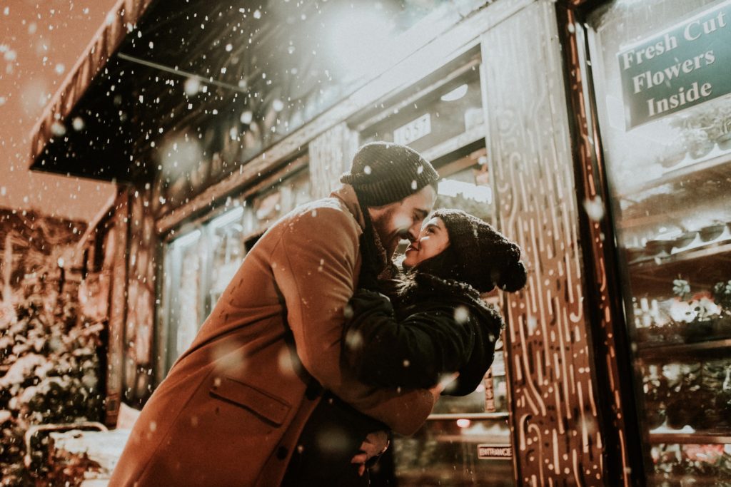 Couple kissing in the snow