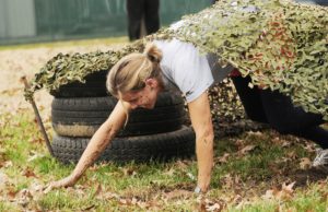 Woman with PTSD and eating disorder in obstacle course