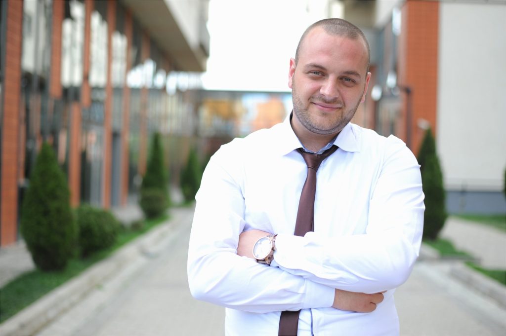 Man standing with his arms crossed