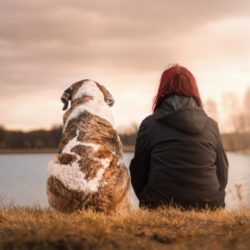 Woman sitting with her dog