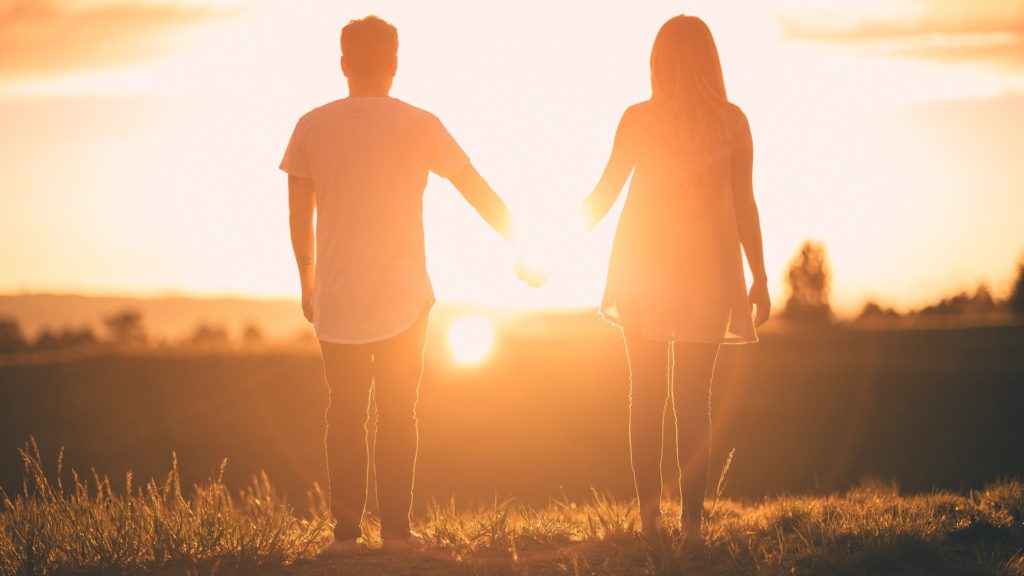 Couple enjoying sunset and discussing Eating Disorders in Transgender Community