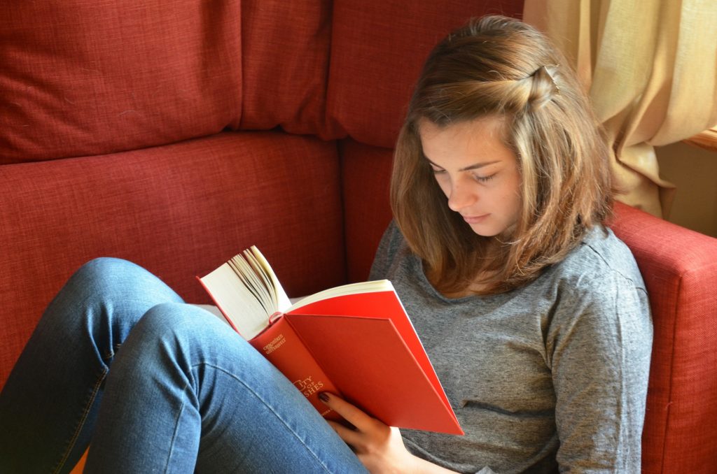 Woman reading about Transtheoretical Intervention Protocol