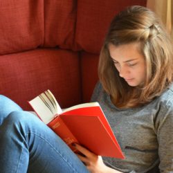 Woman reading about Transtheoretical Intervention Protocol