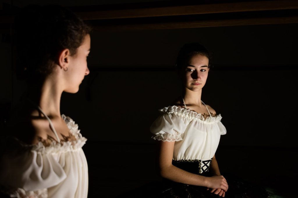 Woman looking at her reflection