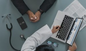 Doctor reviewing Behavioral Activation Therapy with a patient