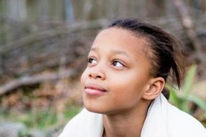 Young African-American girl looking to the future