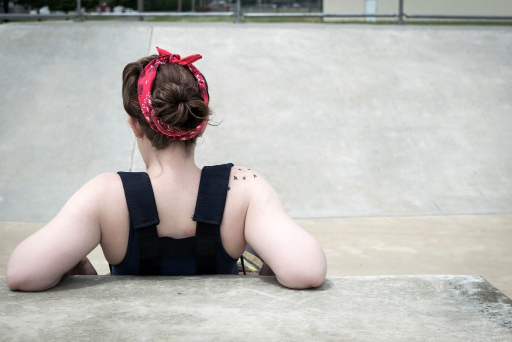 Lady taking a break from Excessive Exercise