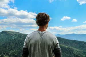 Guy Looking At Mountains