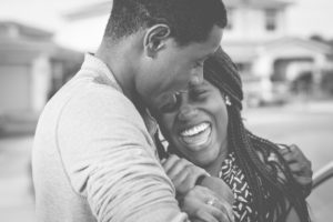 Husband holding his wife and working through marital concerns of an eating disorder