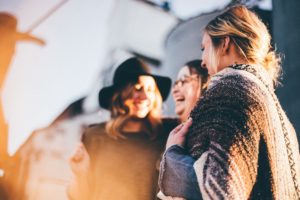 Group of ladies laughing in an eating disorder recovery team