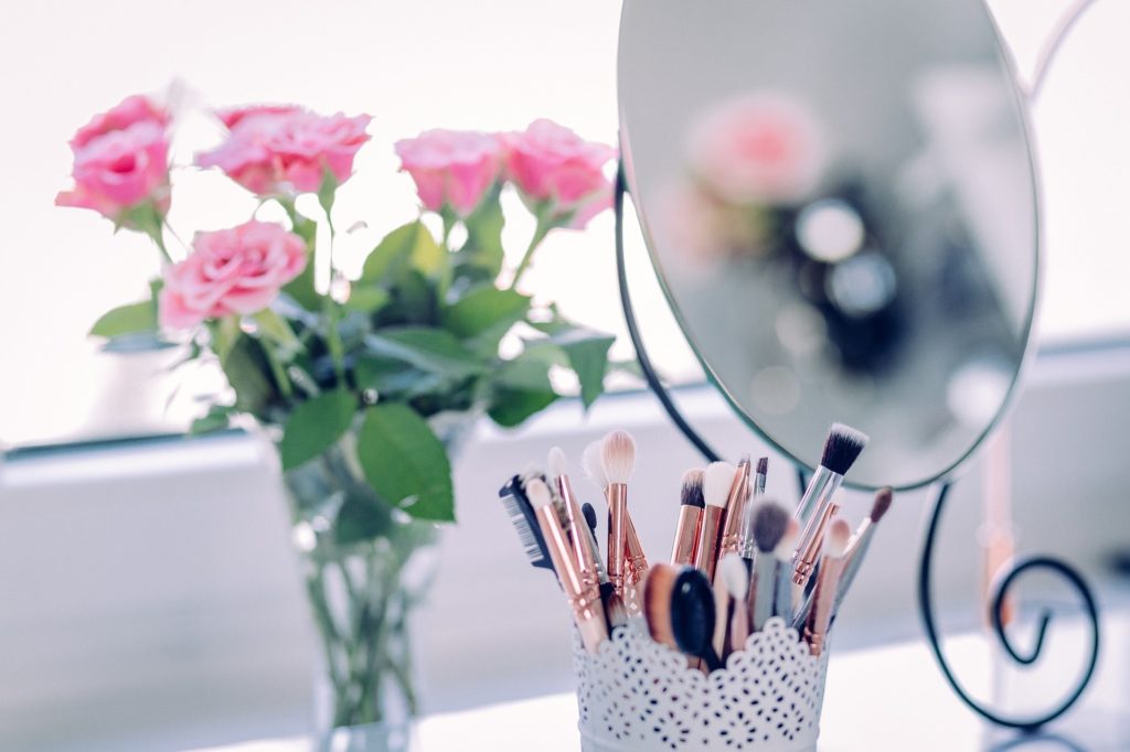 Mirror with Makeup and Roses