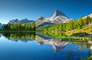 Lake with mountain behind it