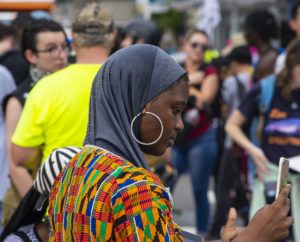 African American Black Woman in in Crowd dealing with Binge Eating Disorder