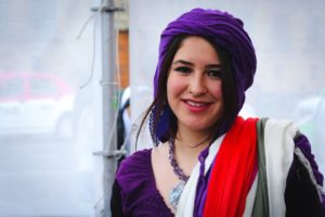 Girl in purple hat dealing with Restrictive Eating