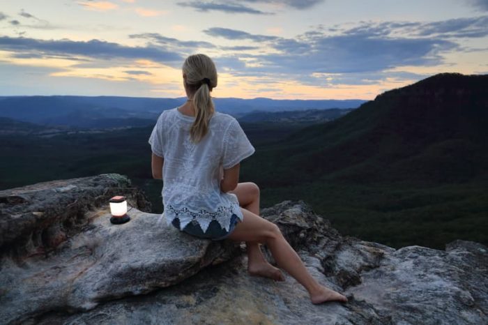 Girl looking at mountain with View