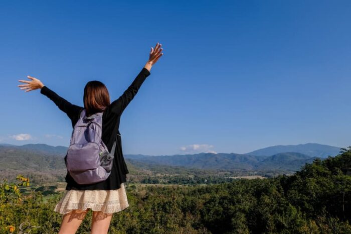 Girl with Hands in Air