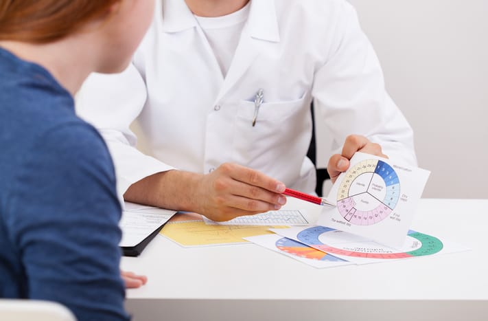 Doctor talking to patient