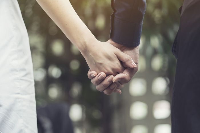 BF and GF holding hands