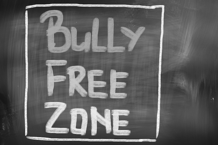 bully free zone on chalk board