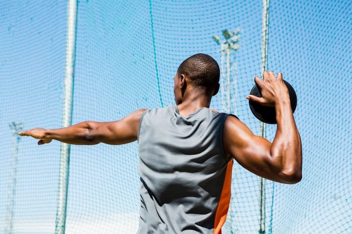 man preparing to throw a discus